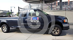 Vehicle with intrepid logo.