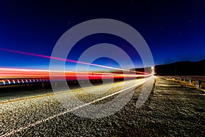 Vehicle Light Trails On Highway