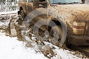 A vehicle stuck in the clay