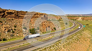 Vehicle Traffic moves along a Divided Highway in southwestern Desert Country