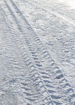 Vehicle tyre tracks on snow