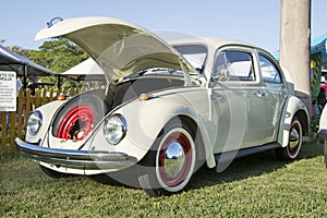 Vehicle Volkswagen Fusca 1973 beetle on display at vintage car show.