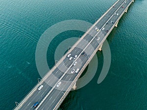 Vehicles on bridge over water