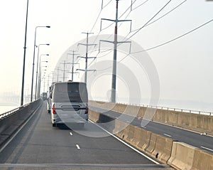 Vehicles on the bridge street photograph