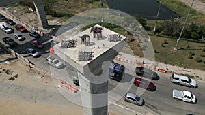 Vehicles circulating between the construction of a bridge