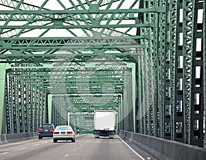 Vehicles Driving Across Bridge