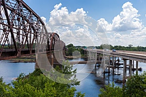 Vehicles passing the border between the states of Texas and Oklahoma over the Red River bridge
