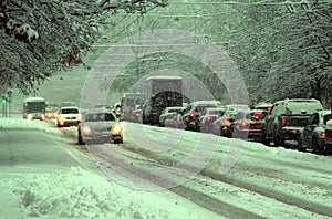 Vehicles traveling on snowy roads