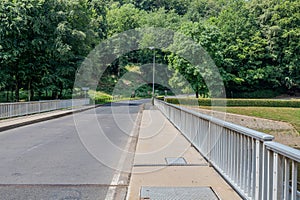 Vehicular bridge over Staumauer Bitburger dam on Stausee Bitburg reservoir river