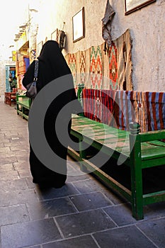 Veiled woman in Souk Wakif in Doha Qatar