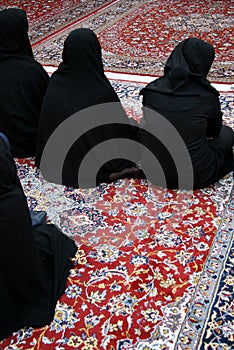 Veiled women in mosque