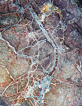 Veins of basalt ore in the rock photo