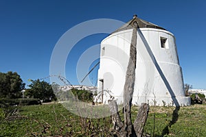 Traditional very old windmill in Vejer de la Frontera, Cadiz, Andalusia, Spain photo