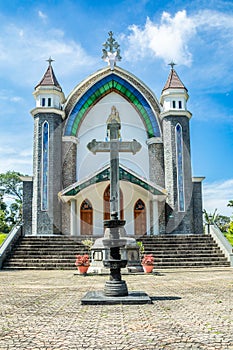 Velankanni Matha catholic church facade with big cross in foreground, Nedumkandom, Kerala, South India