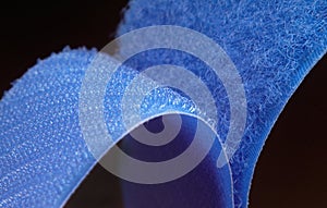 A velcro blue , isolated on black photo