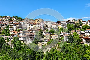 Veliko Tarnovo Bulgaria - houses on the mountain - blue sky