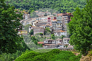 Veliko Tarnovo Bulgaria - houses on the mountain - forest  all around
