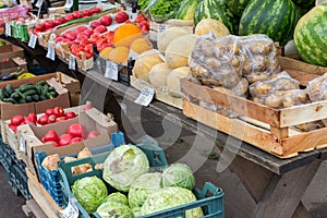 Veliky Novgorod, Russia â€“ July 4, 2019. Russian market selling different types of fresh vegetables, herbs and fruits. Food