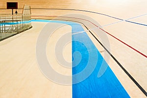 Velodrome cycling track empty curved high wooden floor with markings