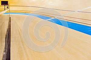 Velodrome cycling track empty curved high wooden floor with markings