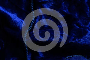 Velour fabric dark blue close up texture for background, wallpaper
