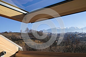 Velux from an mountain lodge with an beautiful view. photo