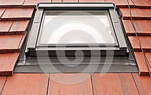 Velux Roof Light on Tiles photo