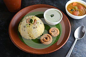 Ven Pongal with Sambar, coconut Chutney popular Indian breakfast