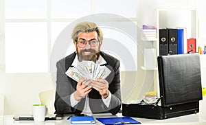 Venality. rich bank worker. investment in yourself. businessman with office bag. successful bearded man got lot of money