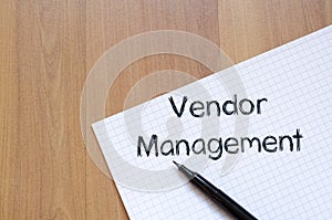 Vendor management write on notebook