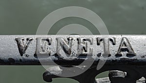 Veneta sign on a bridge in Venice.