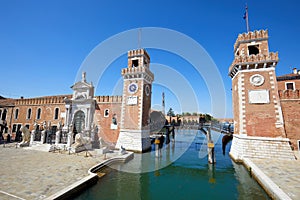 Venetian Arsenal with canal in Venice, Italy photo