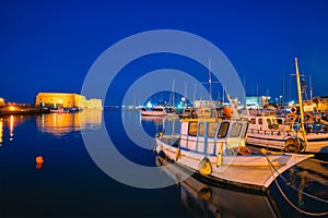 Venetian Fort in Heraklion and moored fishing boats, Crete Island, Greece