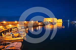 Venetian Fort in Heraklion and moored fishing boats, Crete Island, Greece
