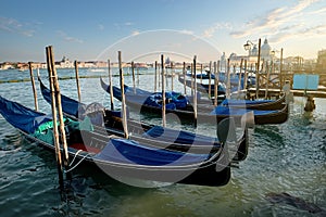 Venetian gondolas at sunset