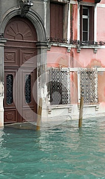 Venetian houses in Venice on the Grand Canal during the high tid