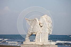 Venetian lion with wings on a beachfront promenade of Larnaca, Cyprus