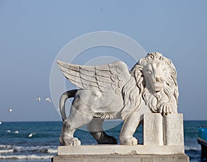 Venetian lion with wings on a beachfront promenade of Larnaca, Cyprus