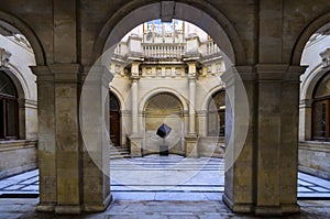 Venetian Loggia. Courtyard`s interior view through the building`s arches. Heraklion city - Crete