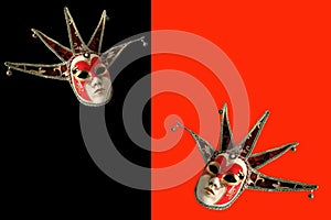 Venetian masks on a black and red background.