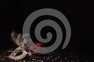 Venetian masks for carnival on a black background