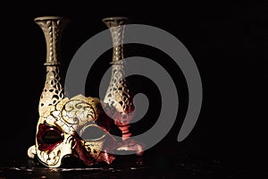 Venetian masks for carnival on a black background