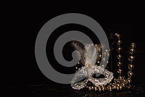 Venetian masks for carnival on a black background