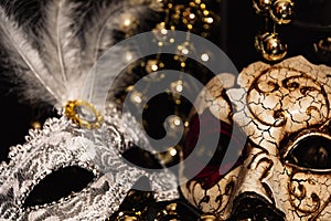 Venetian masks for carnival on a black background