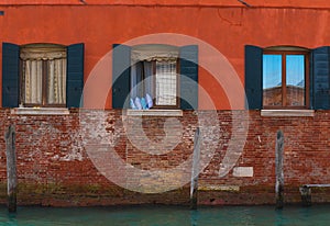 Venetian windows, Italy.