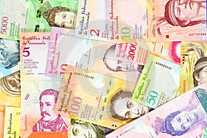 Venezuela bolivar banknotes, different bills. Beautiful colorful obverse side bolivares close up background photo