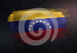 Venezuela Flag Made of Metallic Brush Paint on Grunge Dark Wall photo