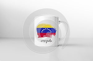 Venezuela flag on white coffee mug.