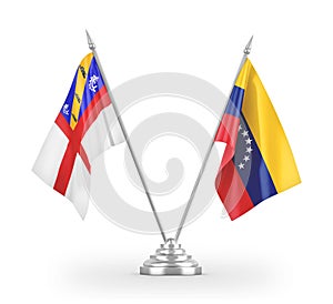 Venezuela and Herm table flags isolated on white 3D rendering