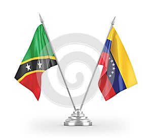 Venezuela and Saint Kitts and Nevis table flags isolated on white 3D rendering